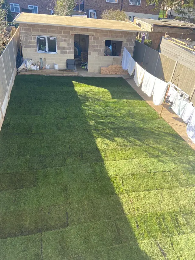 Freshly laid turf lawn in a long back garden